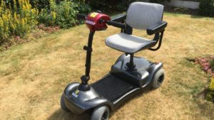 Mobility Scooter On Grass — Mobility Shop In Tweed Heads, NSW