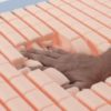 Person Pressing Softform Mattress Foam