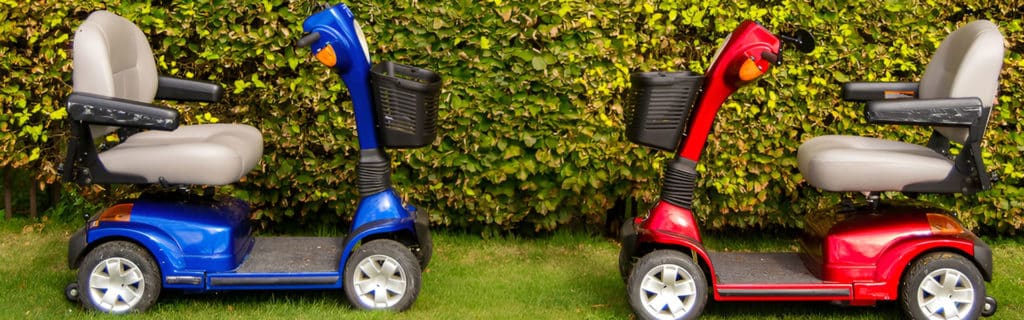 Red & Blue Mobility Scooters — Mobility Shop In Tweed Heads, NSW