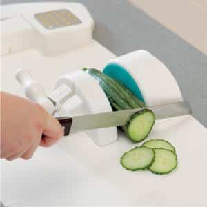 Homecraft Kitchen Workstation Cutting Cucumber — Mobility Shop In Tweed Heads, NSW