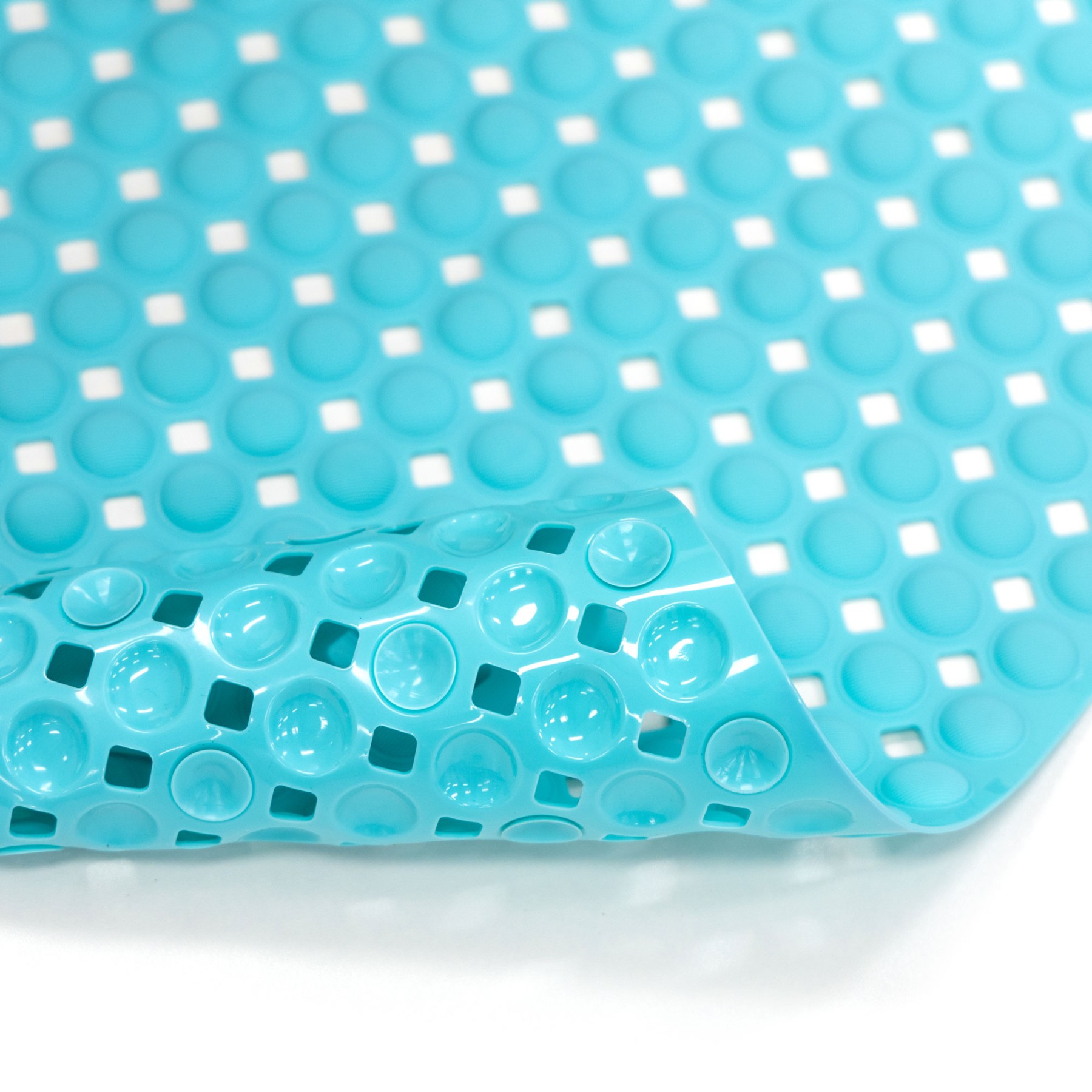 Conni anti-slip shower mat in turquoise plastic with a perforated surface and raised suction circles, shown with a curled edge on a white background.