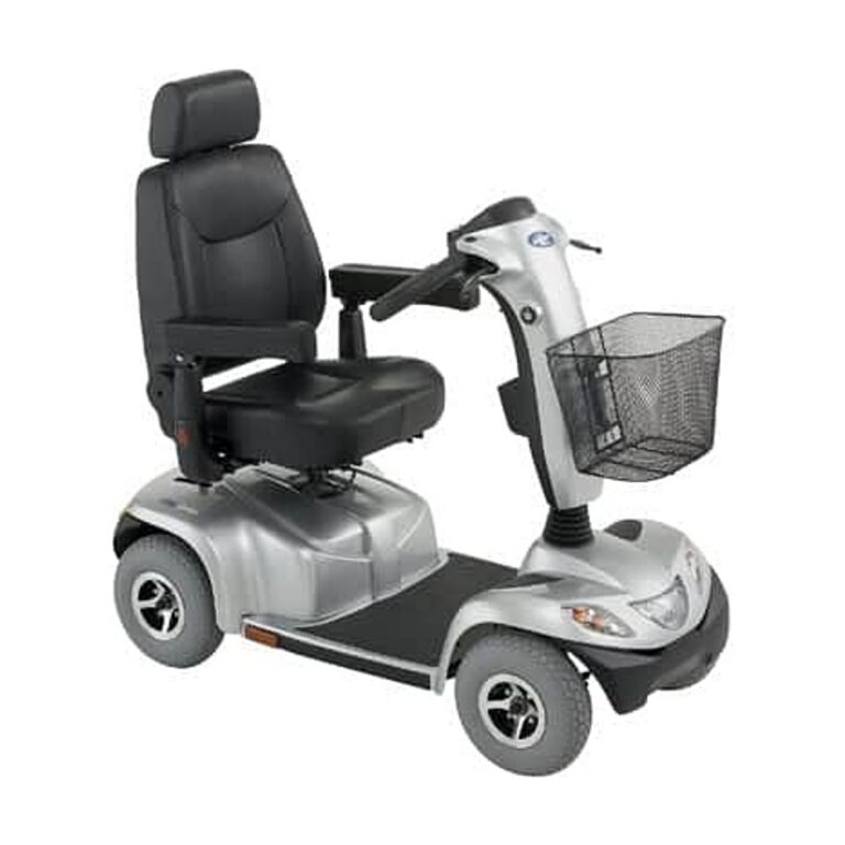 Invacare Pegasus mobility scooter in silver and black with a padded seat, front basket, and three-wheel design.