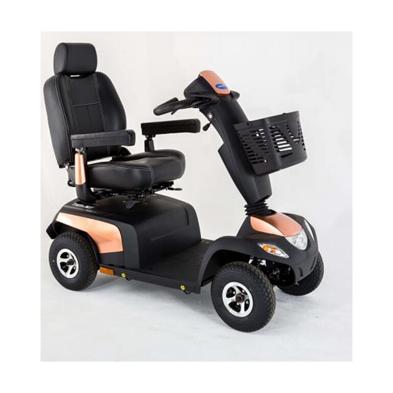 Invacare Pegasus Pro mobility scooter in black with copper accents and a padded black seat, shown with a front basket and four wheels.