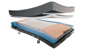 Enable Lifecare Elata E400 adjustable bed mattress in gray and peach fabric with a layered foam design, shown split above a curved adjustable base.