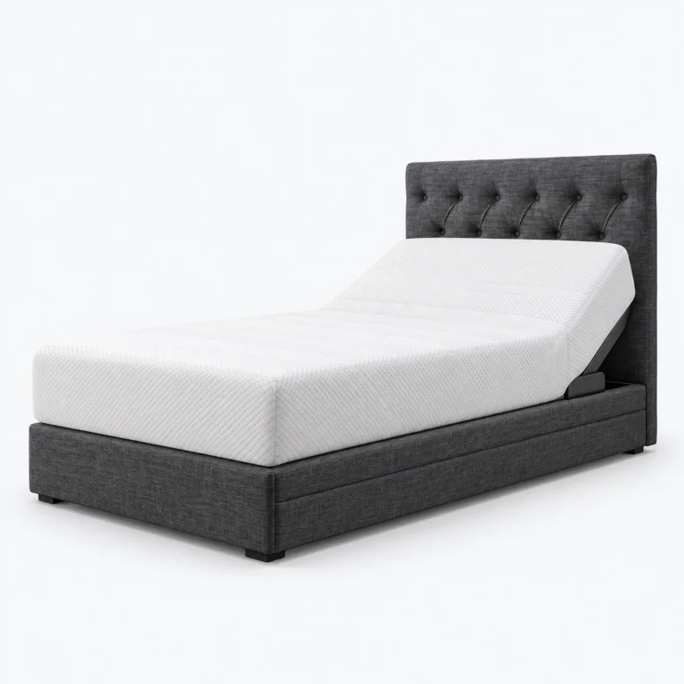 A dark gray upholstered adjustable bed with a tufted headboard and a white mattress on a plain white background.