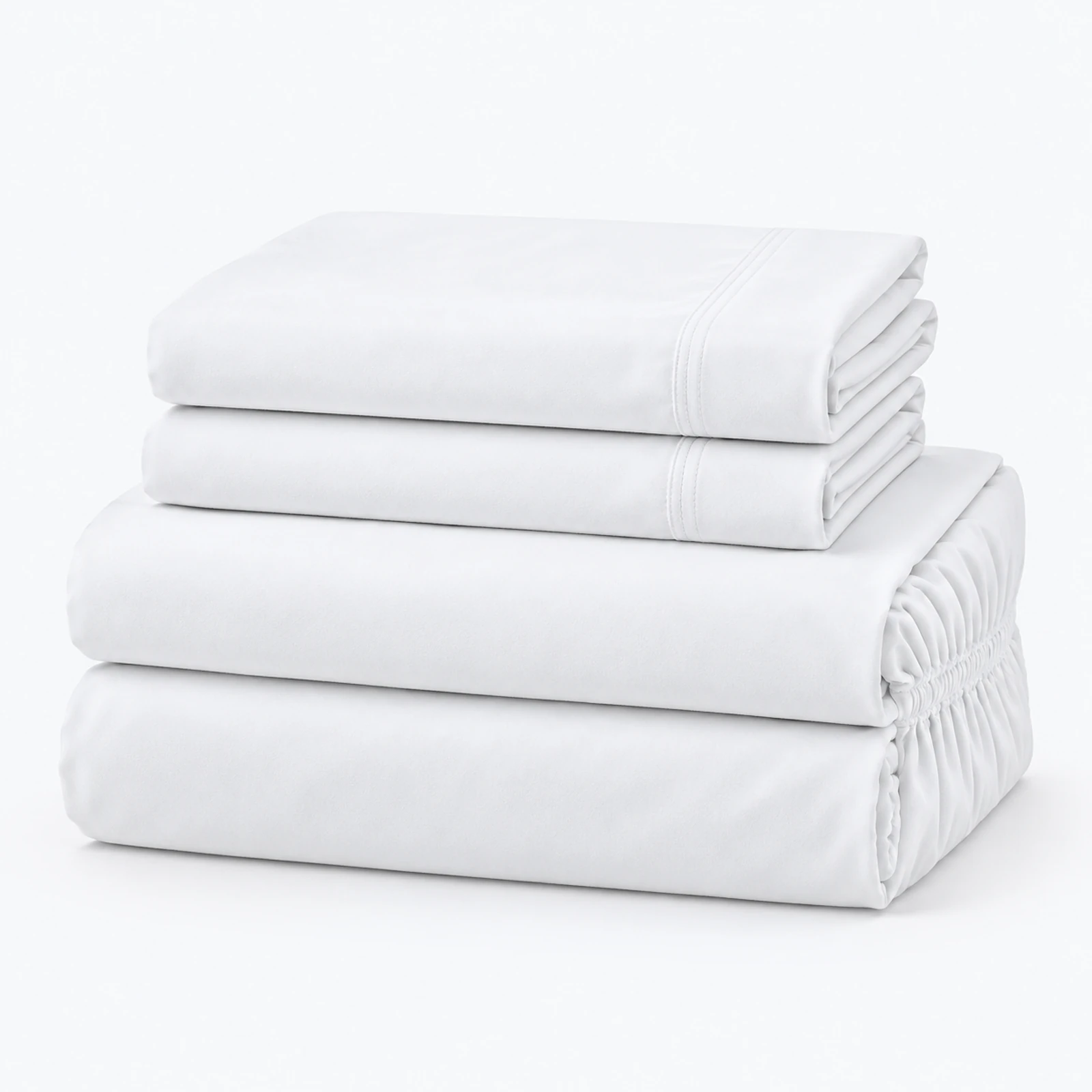 Four folded white bed sheets stacked on a white background, with elastic edges visible on the bottom sheet.