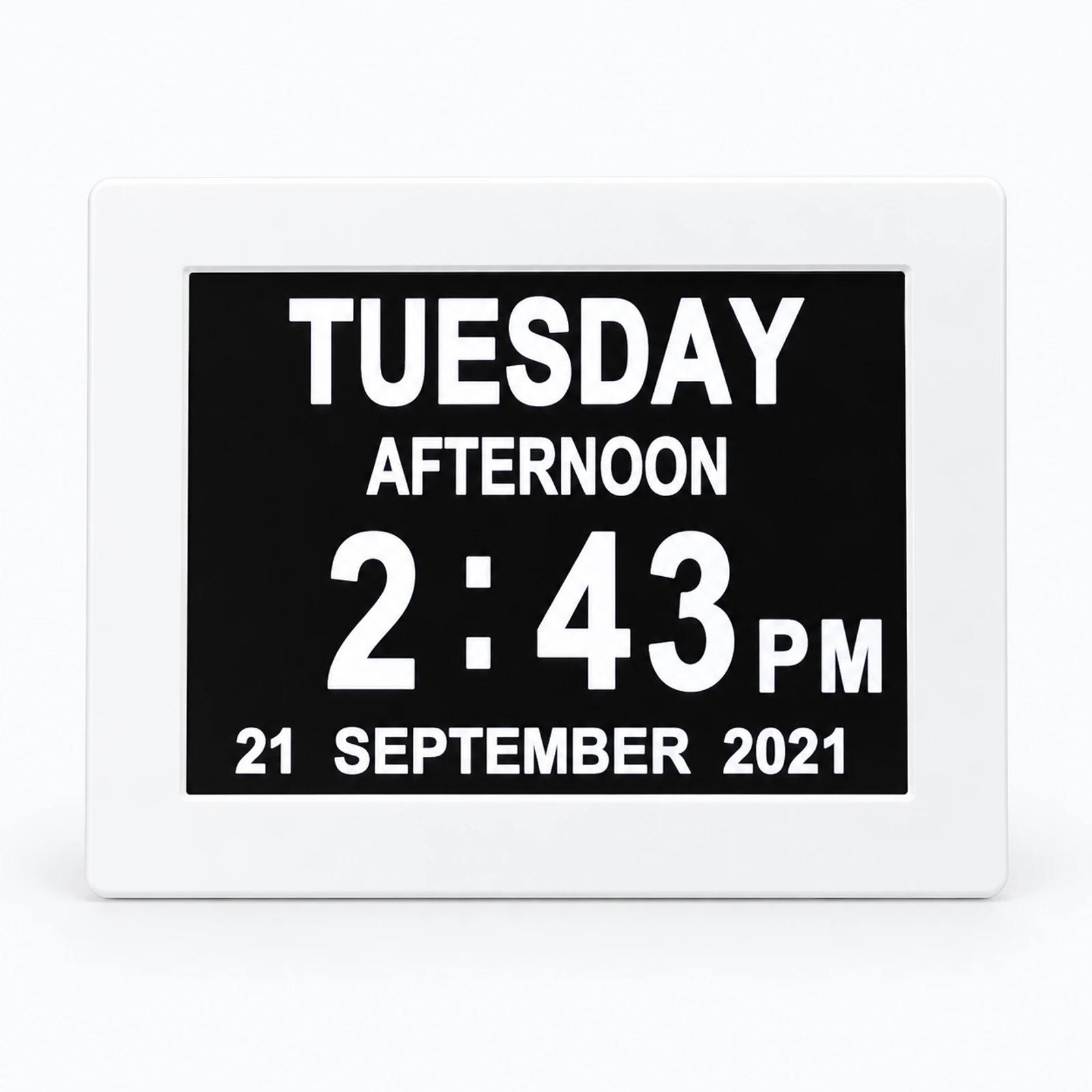 A white digital desk clock displays Tuesday afternoon, 2:43 PM, and 21 September 2021 on a black screen.