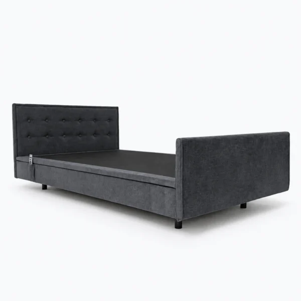 A dark gray upholstered bed frame with a tufted headboard and matching footboard is shown on a white background.
