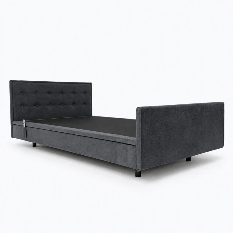 A dark gray upholstered bed frame with a tufted headboard and matching footboard is shown on a white background.