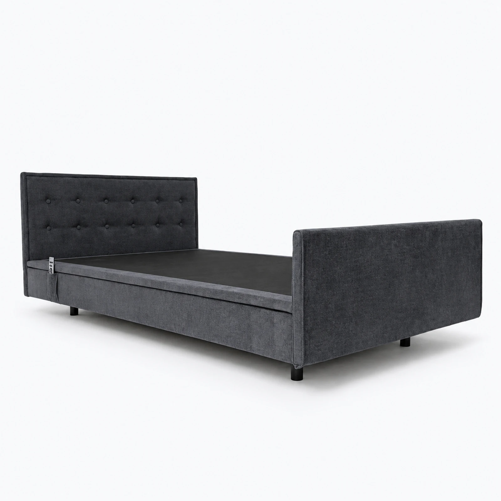 A dark gray upholstered bed frame with a tufted headboard and matching footboard is shown on a white background.