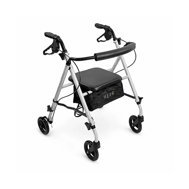 A silver walker with four black wheels, two hand brakes, and a black seat pouch labeled HERO on a white background.
