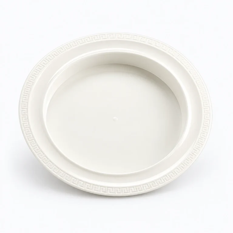 A white oval serving platter with a subtle geometric rim pattern, shown on a plain white background.