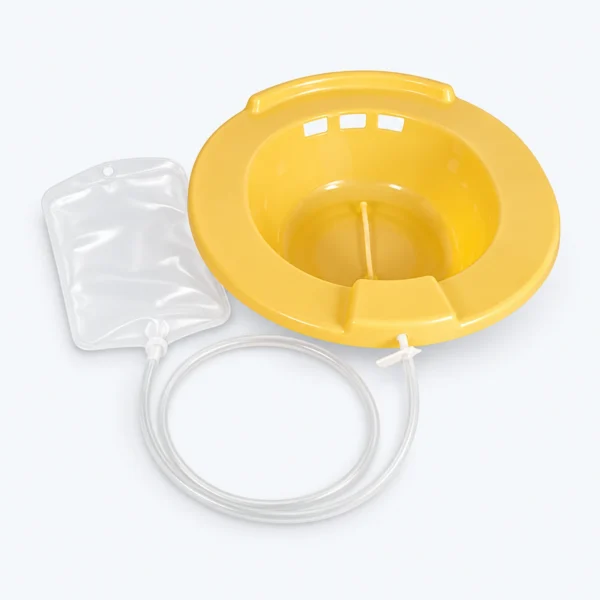 A yellow portable bedpan with a clear drainage tube and attached collection bag on a white background.
