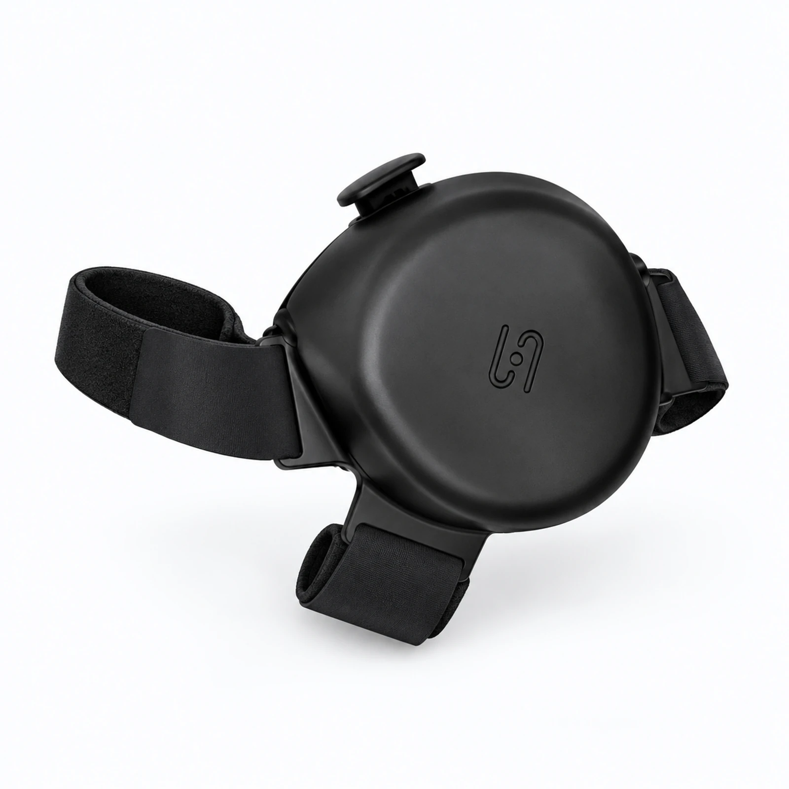 A black round plastic device with adjustable straps, shown on a white background.