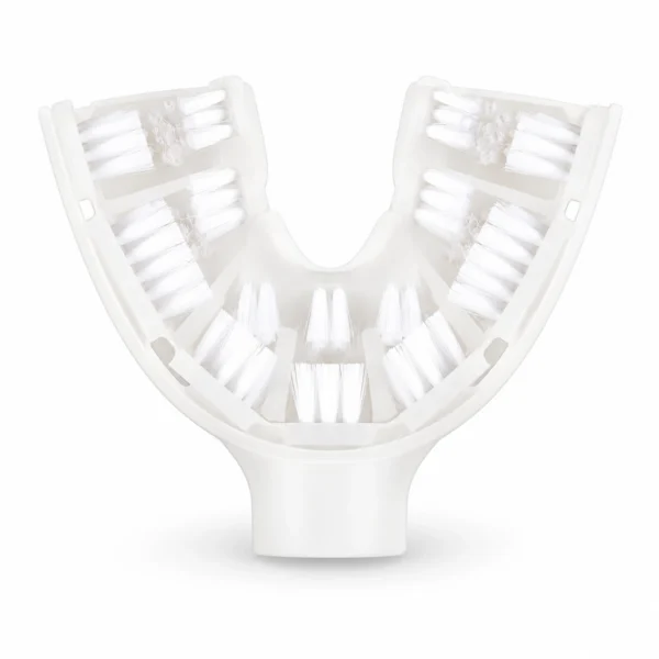 A transparent U-shaped mouthguard with white bristles is shown on a white background.